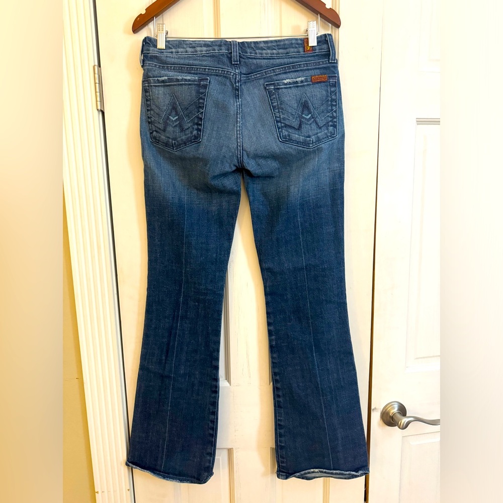 7 for all mankind Size 29 “A” pocket jeans. Boot cut/ flare.
